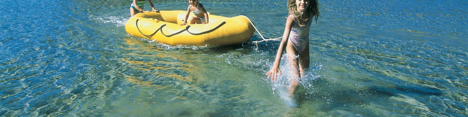 Nahuel Huapi National Park featuring a lake or waterhole and boating as well as children