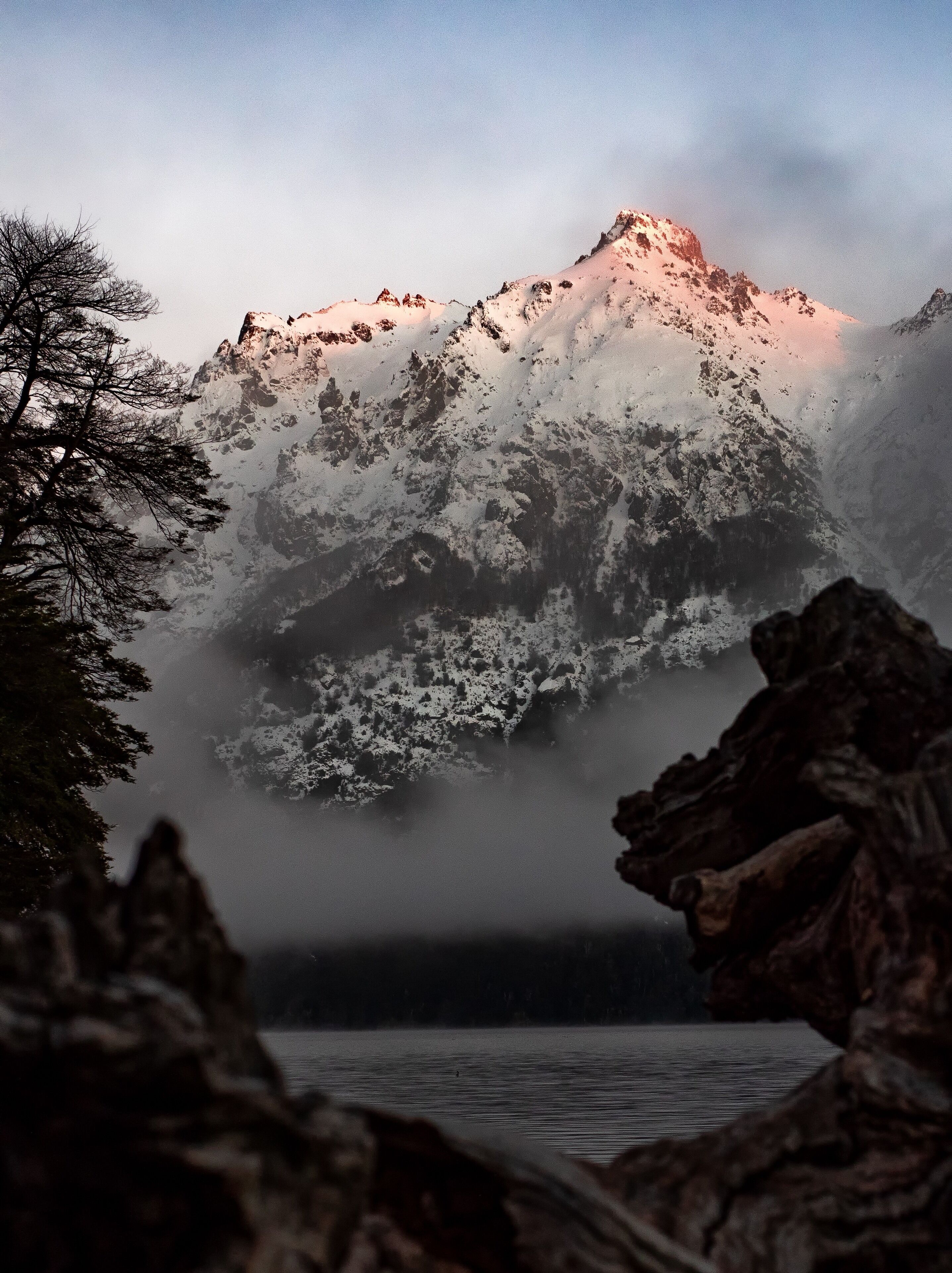 A heavy mist hovered above Lake Gutierrez as we headed south on Ruta 40 in Northern Patagonia. The sun crept over the mountains and kissed the peaks good morning as the fog lifted. #adventure photo contest #localsecrets #trovember