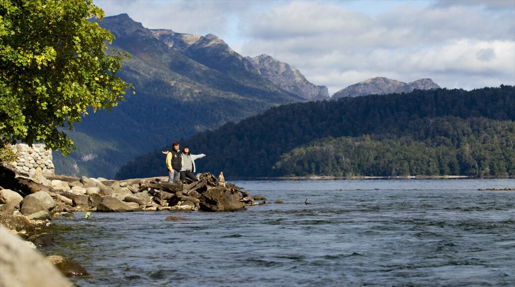 Nahuel Huapi National Park showing a lake or waterhole as well as a couple