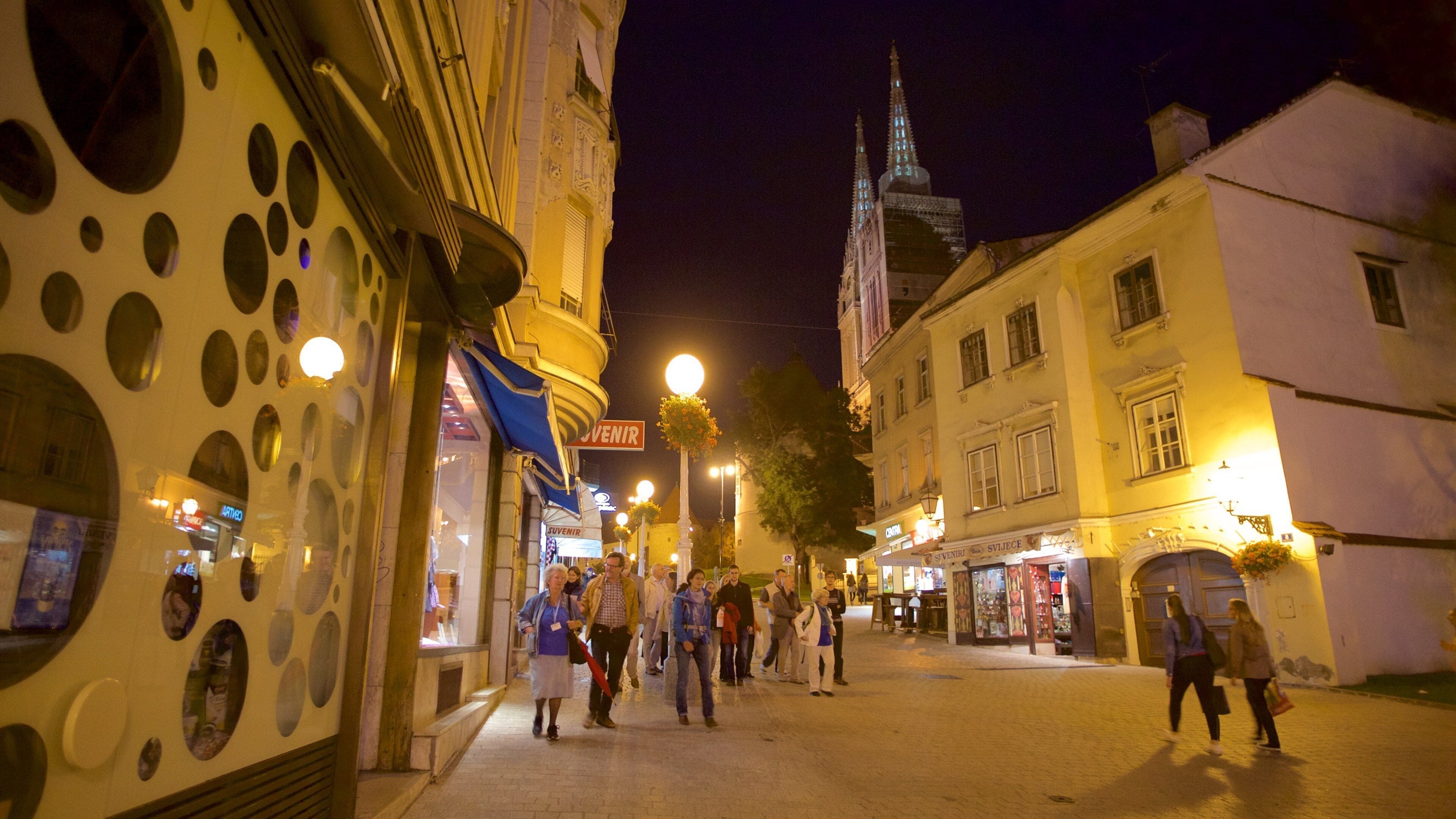 Ban Jelacic Square which includes night scenes, heritage architecture and a square or plaza