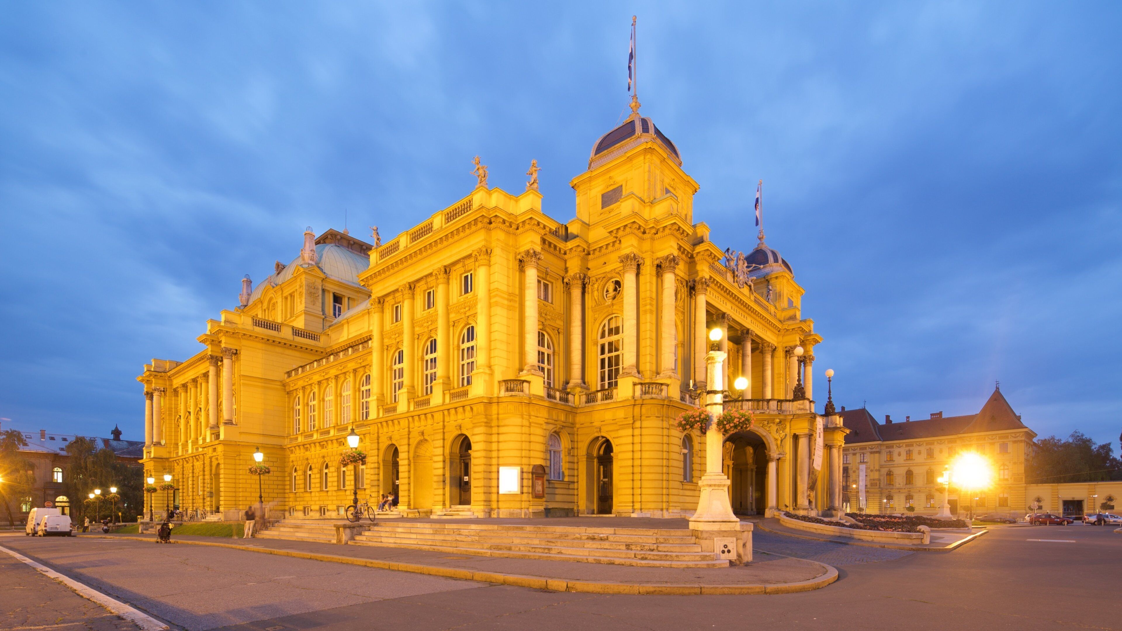 Croatian National Theatre which includes night scenes, heritage architecture and theater scenes