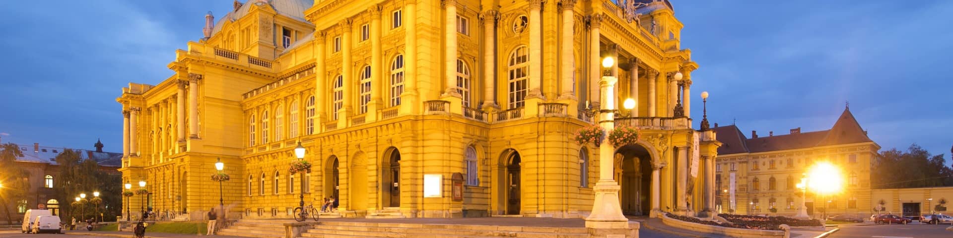 Croatian National Theatre which includes night scenes, heritage architecture and theater scenes