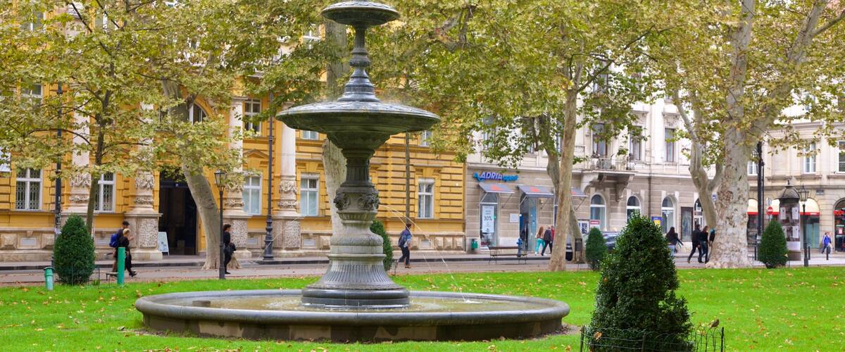 Zrinjevac mostrando una fuente, un jardín y una ciudad