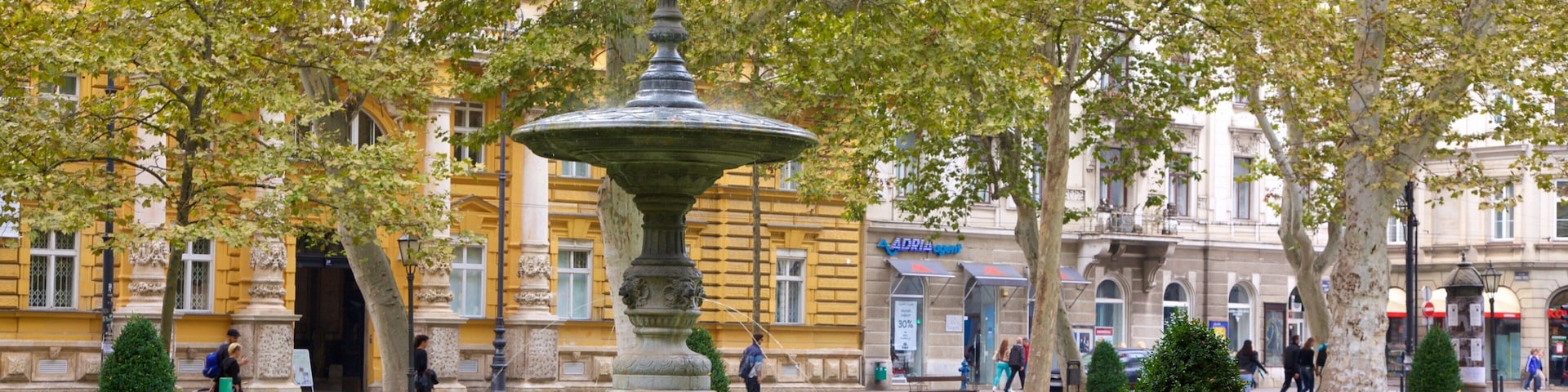 Zrinjevac which includes a city, a garden and a fountain