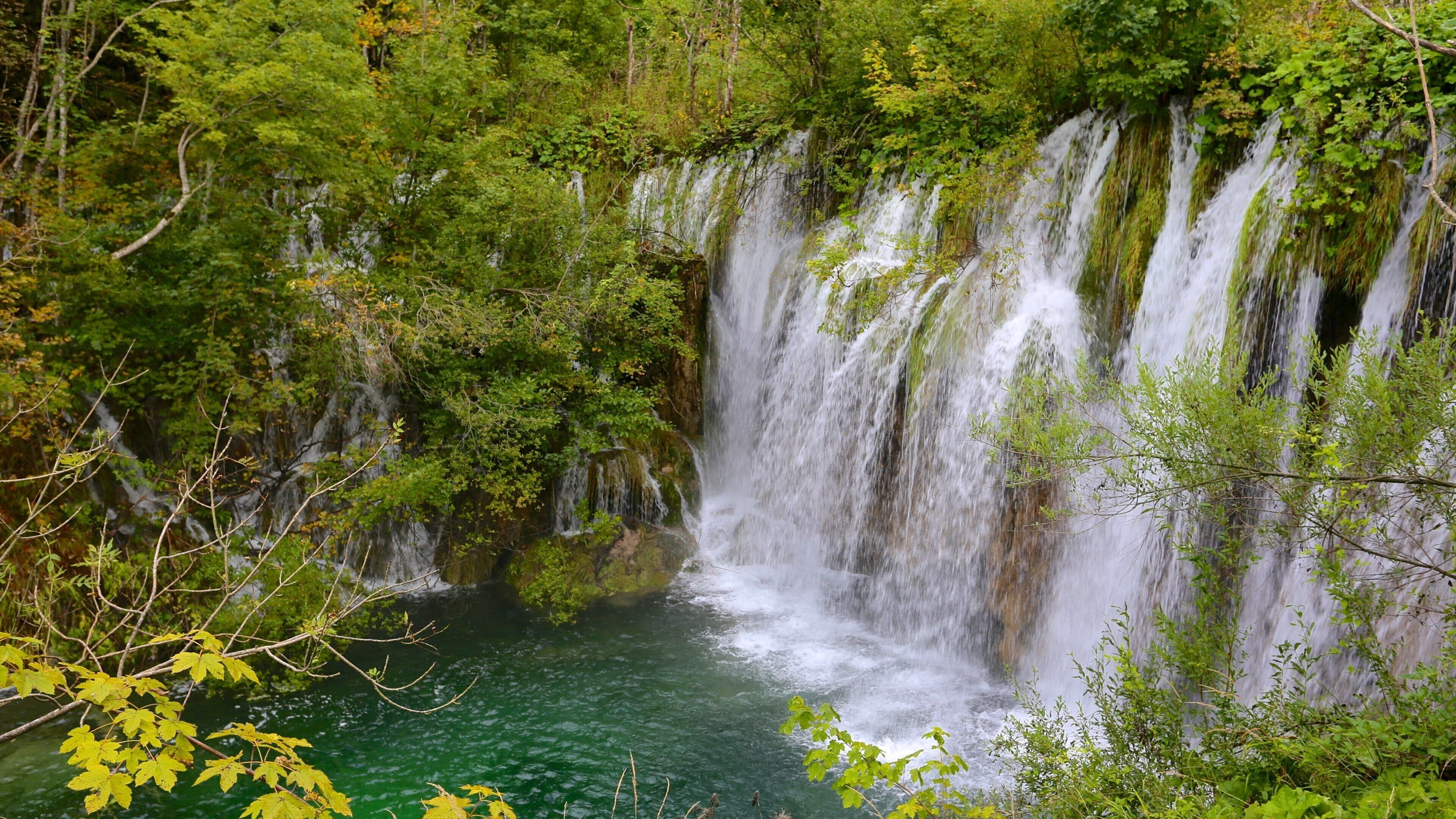 Plitvice Lakes National Park - Entrance 1 featuring a cascade and a lake or waterhole