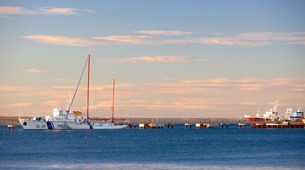 Puerto Madryn Beach featuring a sunset and general coastal views