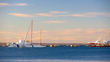 Puerto Madryn Beach featuring a sunset and general coastal views
