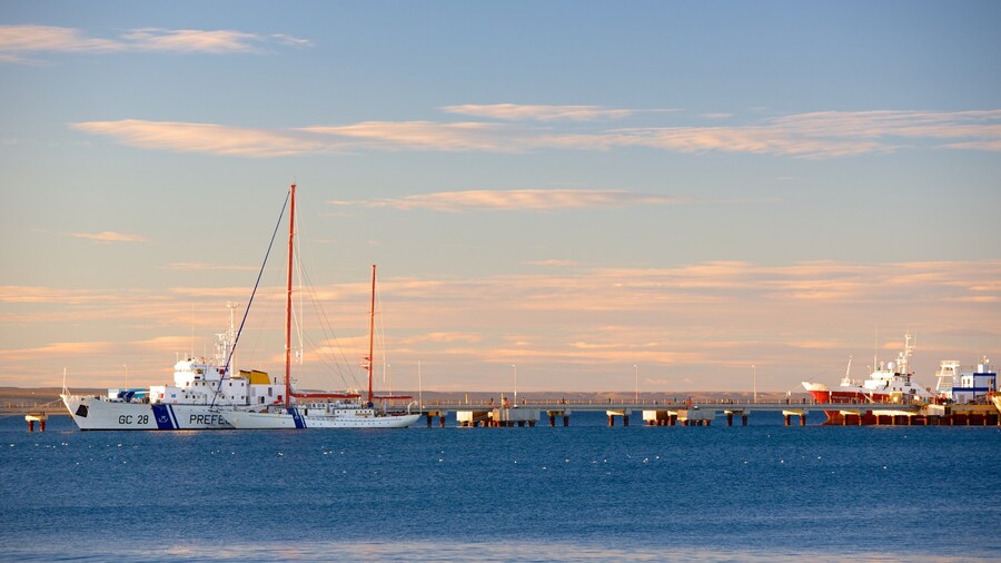 Puerto Madryn Beach featuring a sunset and general coastal views