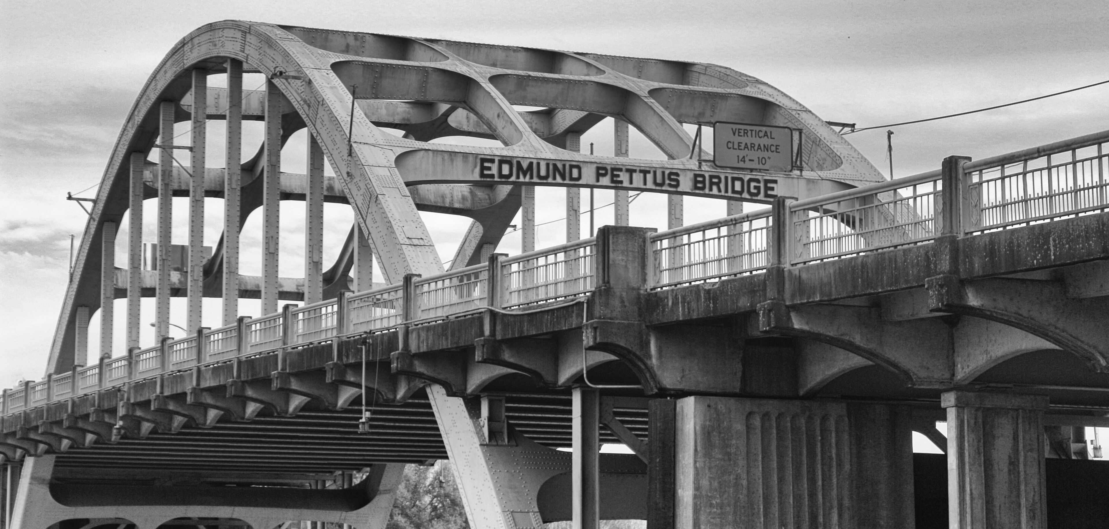 The Edmund Pettus Bridge with vertical clearance signs.