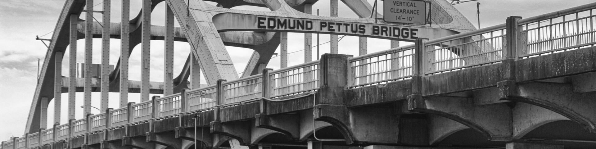 The Edmund Pettus Bridge with vertical clearance signs.