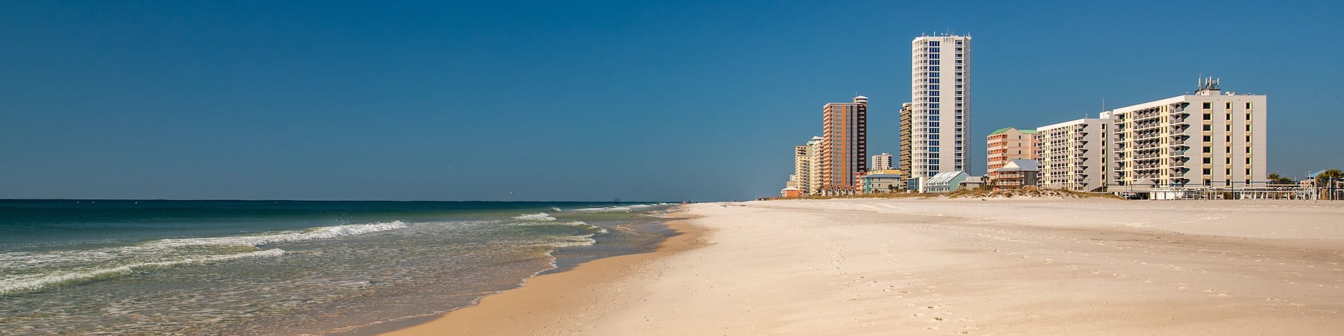 Gulf Shores Beach showing a coastal town, general coastal views and a beach