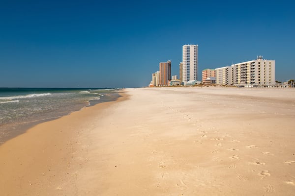Gulf Shores Beach showing a coastal town, general coastal views and a beach