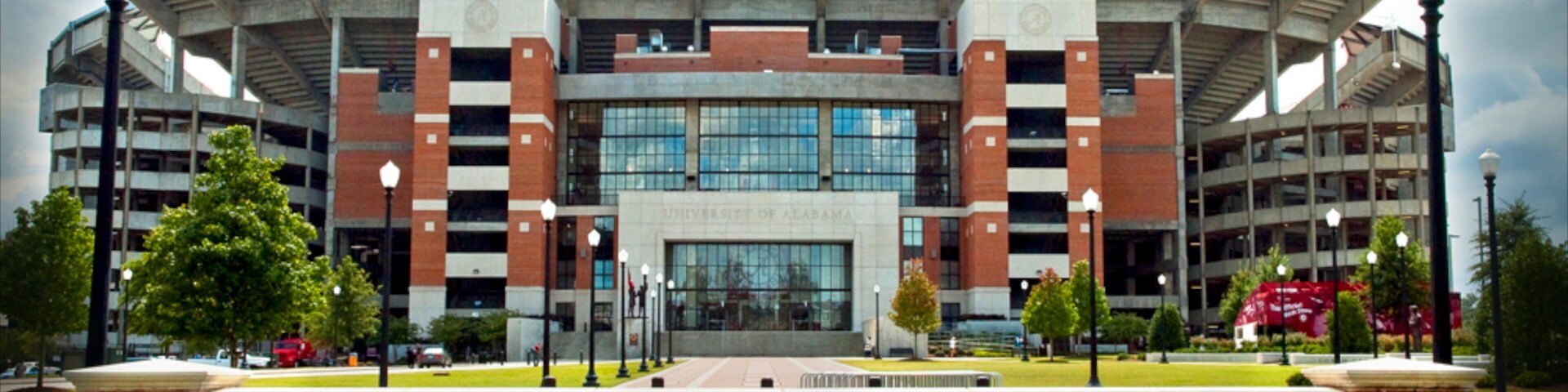 Tuscaloosa which includes signage and flowers