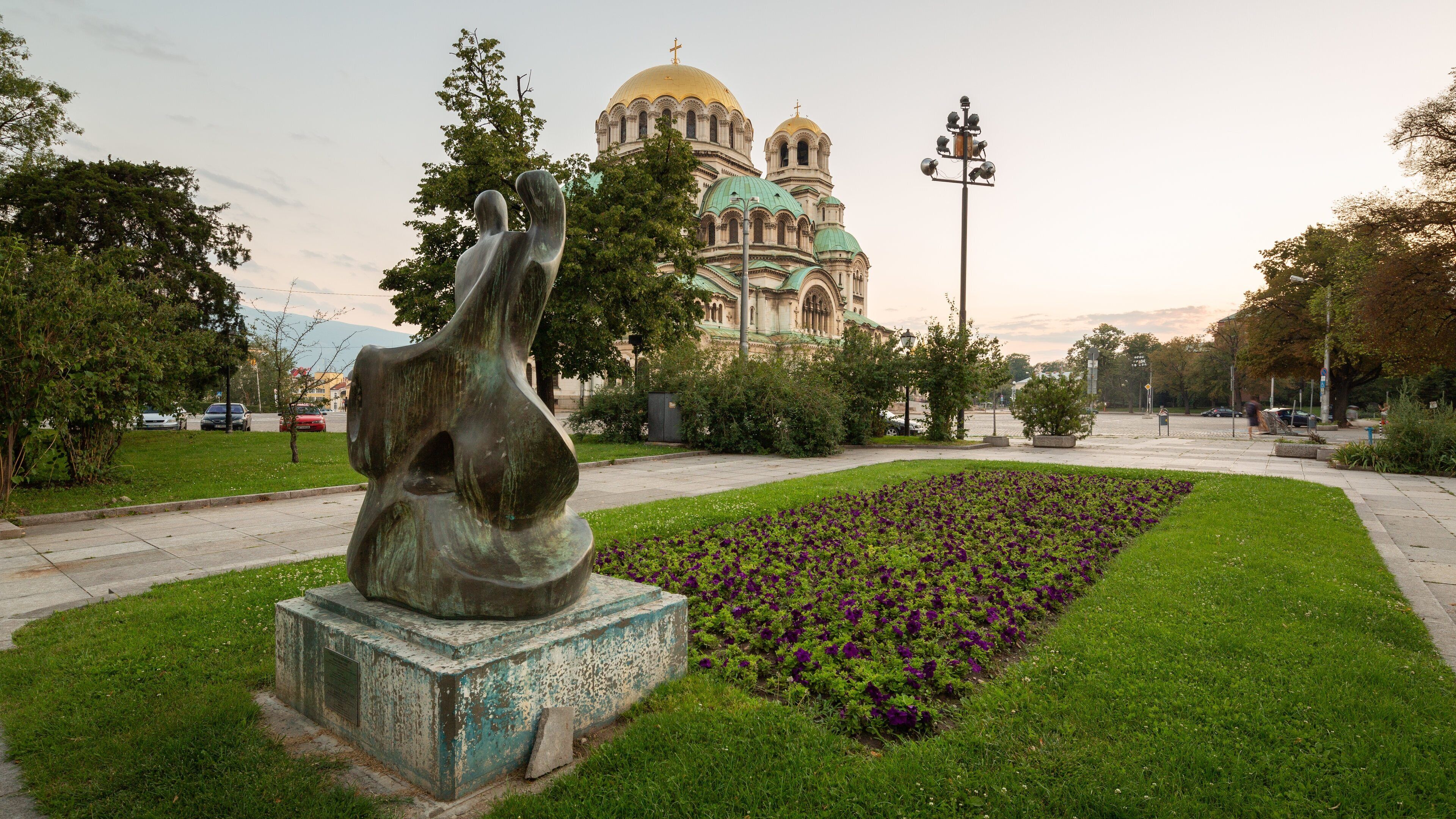 Alexander Nevski Cathedral which includes a sunset, outdoor art and heritage architecture