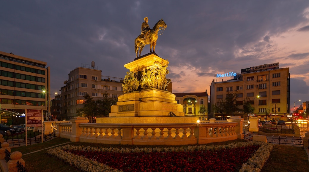 Monument to the Liberating Tsar showing night scenes, a statue or sculpture and heritage elements