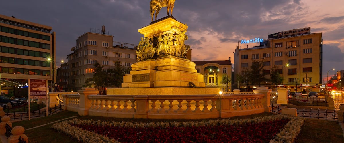 Monument to the Liberating Tsar showing night scenes, a statue or sculpture and heritage elements