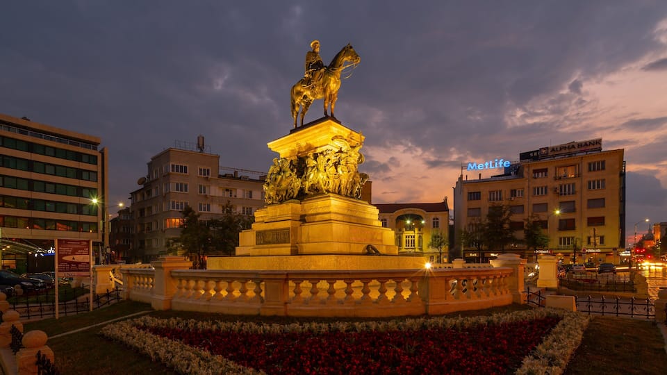 Monument to the Liberating Tsar showing night scenes, a statue or sculpture and heritage elements