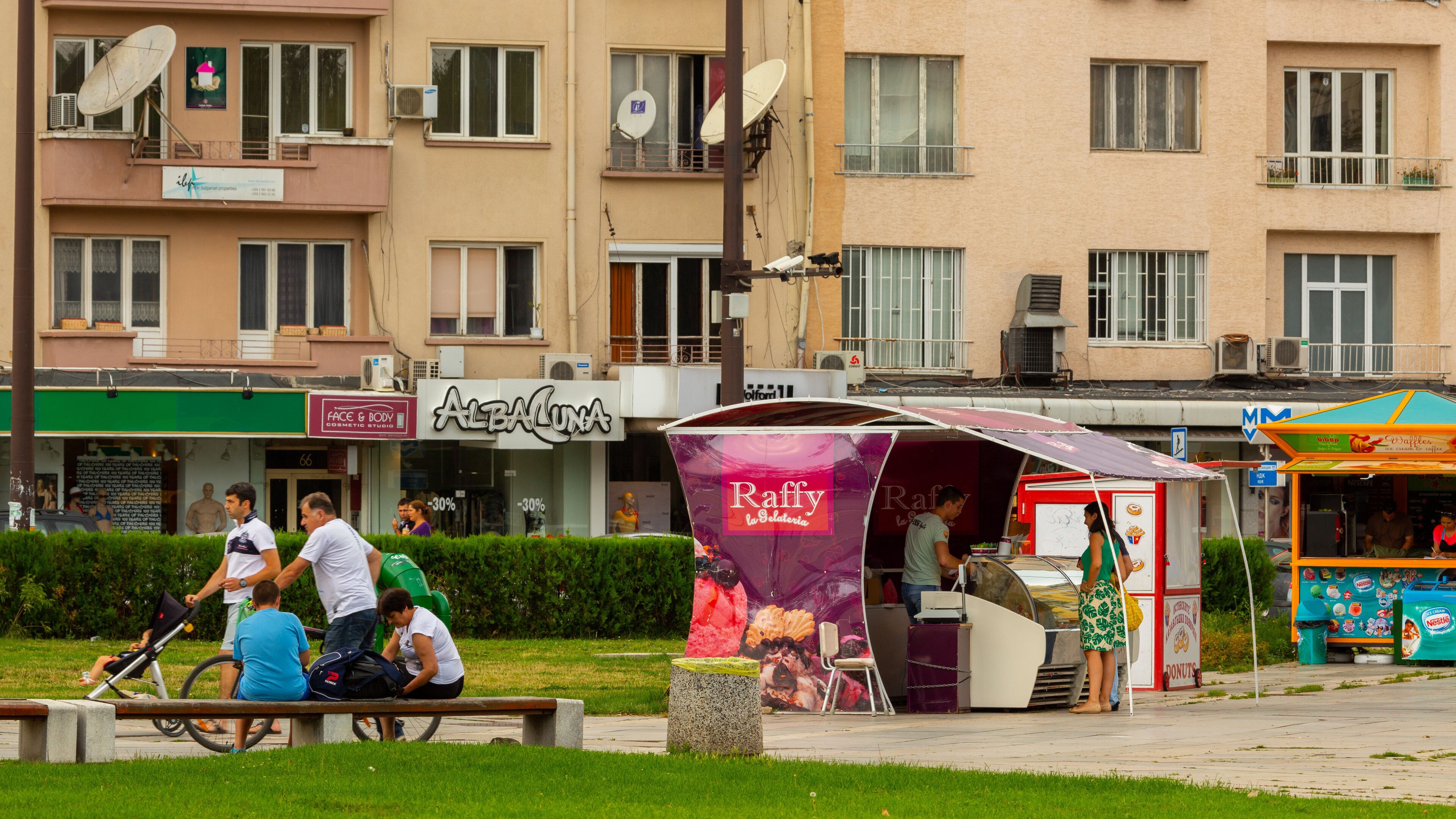 National Palace of Culture showing street scenes and markets