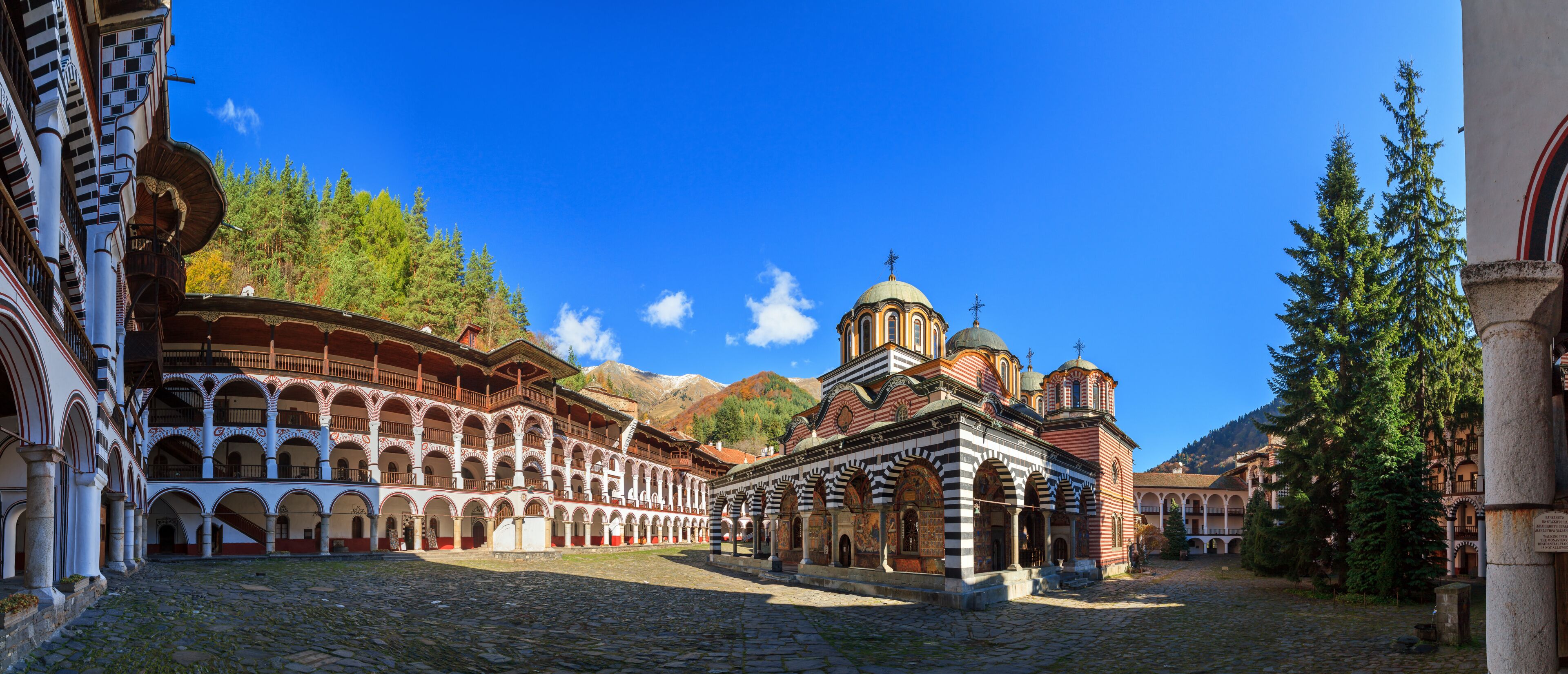 Beautiful panoramic panorama of the Orthodox Rila Monastery, a famous tourist attraction and cultural heritage monument in the Rila Nature Park mountains in Bulgaria