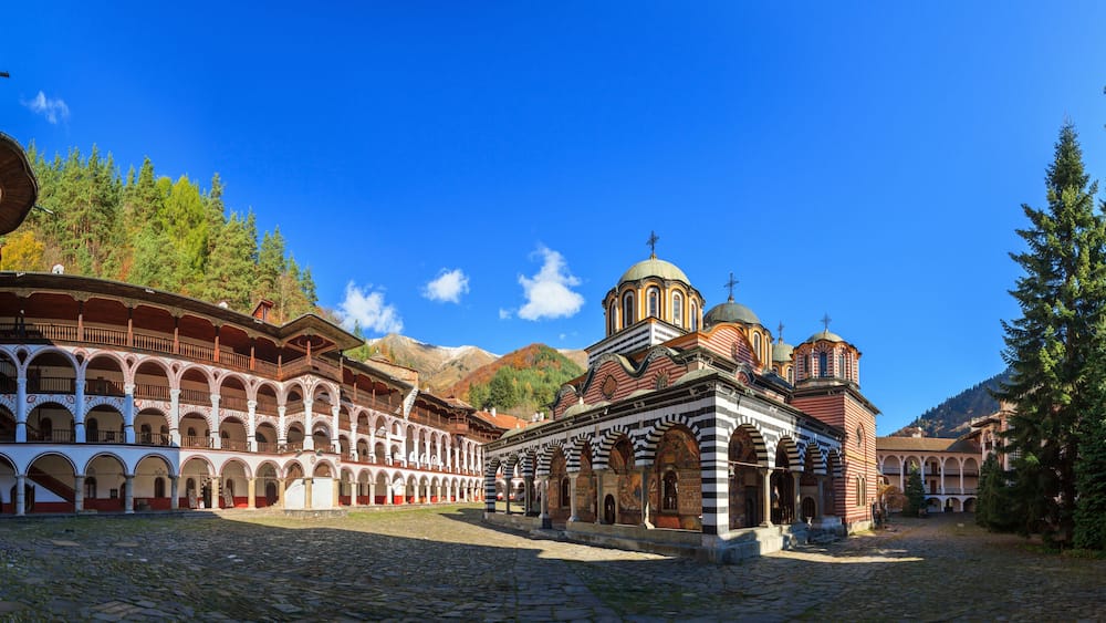 Beautiful panoramic panorama of the Orthodox Rila Monastery, a famous tourist attraction and cultural heritage monument in the Rila Nature Park mountains in Bulgaria