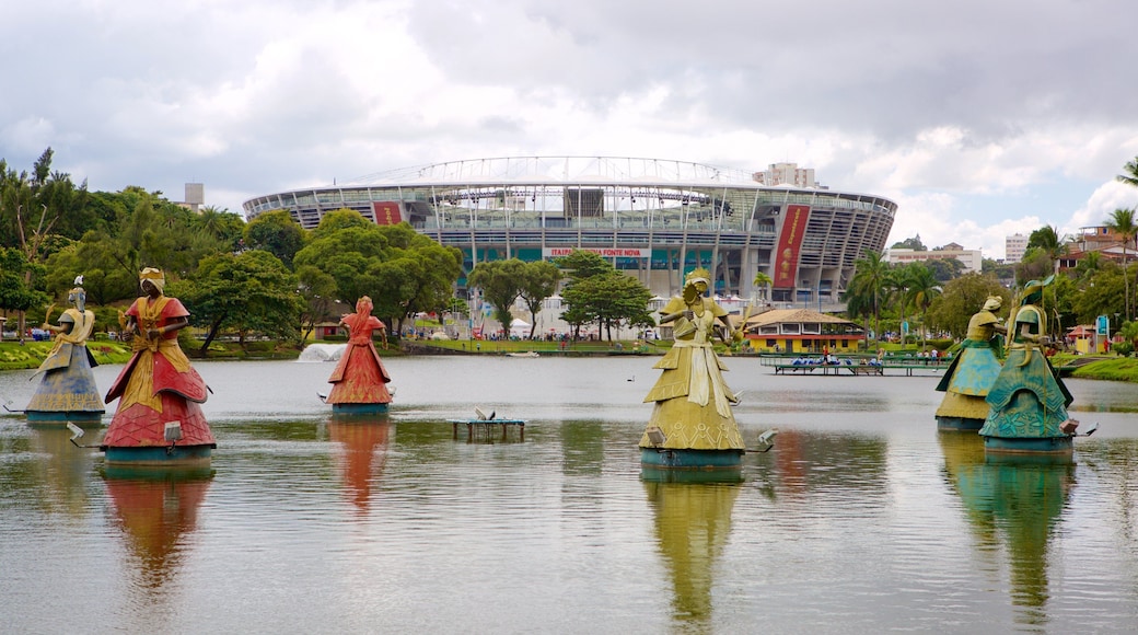 Fonte Nova Stadium which includes a lake or waterhole, a park and a statue or sculpture
