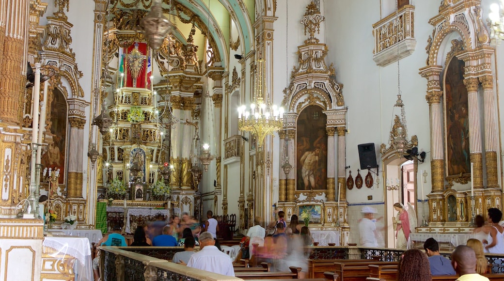 Church of Nosso Senhor do Bonfim which includes a church or cathedral, religious elements and interior views