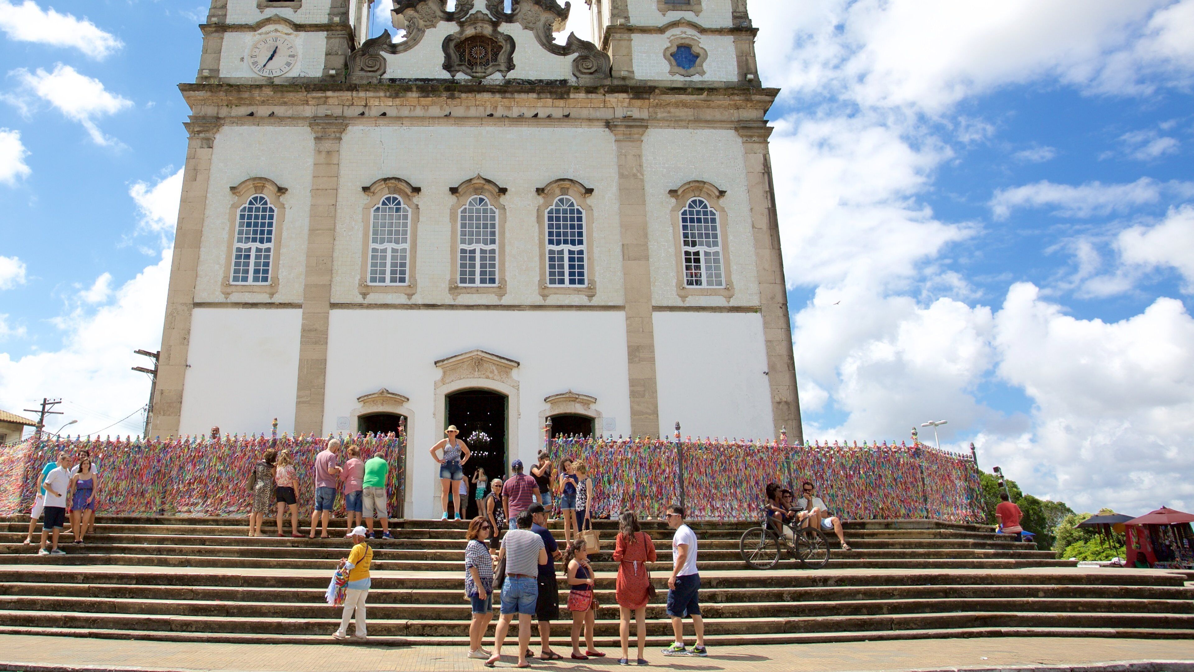 Church of Nosso Senhor do Bonfim which includes religious aspects and a church or cathedral as well as a family