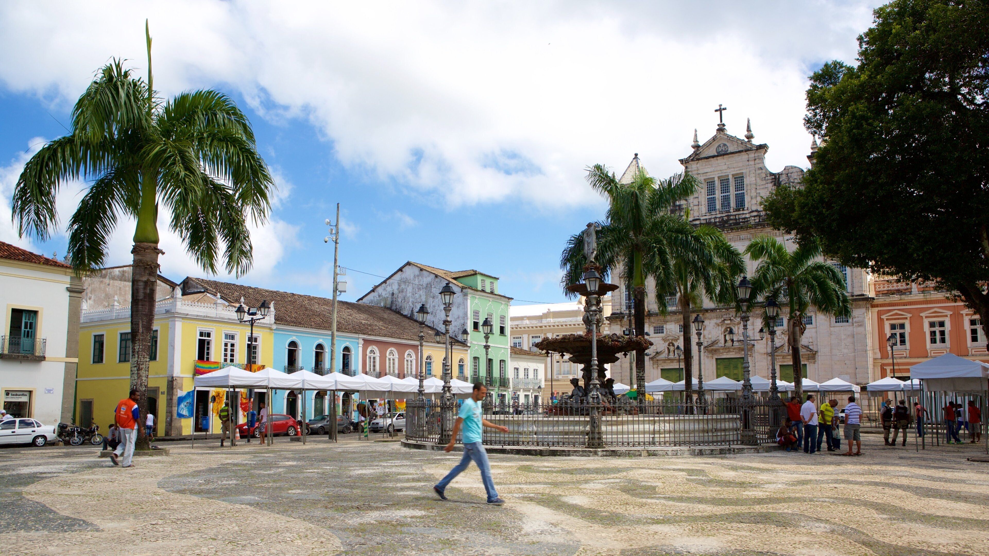 Terreiro de Jesus featuring a fountain, a square or plaza and street scenes