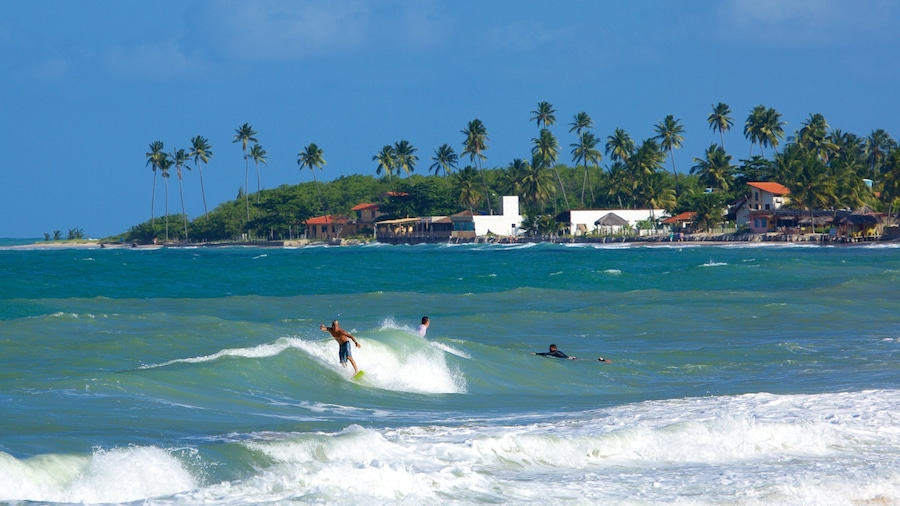 Maracaipe Beach featuring surfing, general coastal views and a coastal town