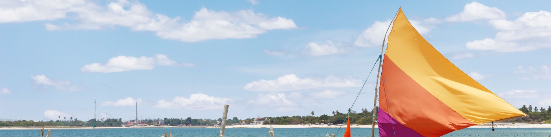 beautiful sail boat and hammocks at the Paradise Lake (Jericoacoara, Brazil)