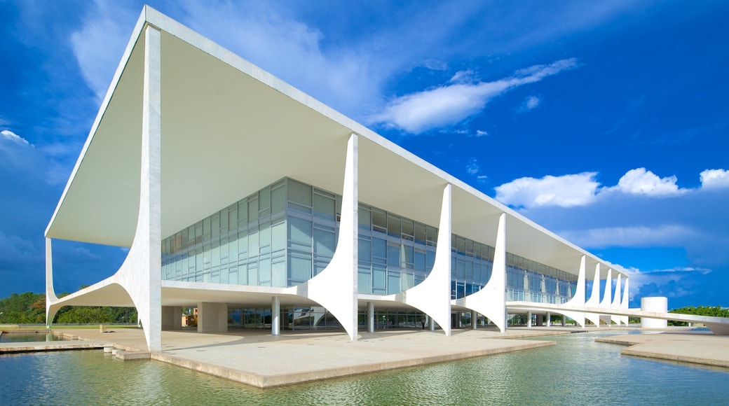 Planalto Palace featuring modern architecture, a pond and château or palace