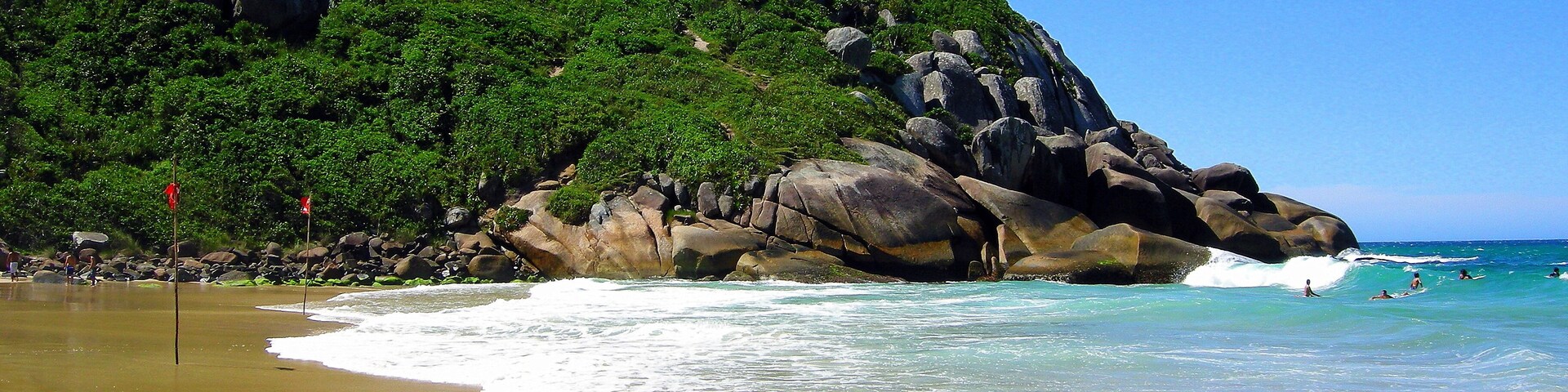 Brava Beach facing the ocean, with strong waves, beyond the standard calm beaches of the North of the Island of Santa Catarina, Brazil