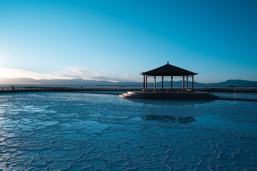 Textured Salt Flats of Chaka Salt Lake, Qinghai China - Traditional Chinese Pavilion at Dawn, Blue Sky Landscape