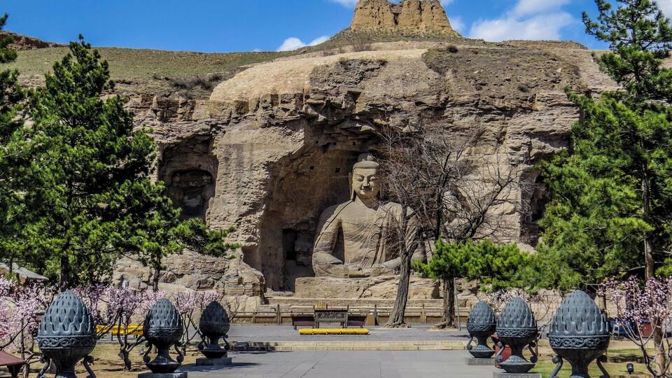 Statue at Yungang Grottoes, China.