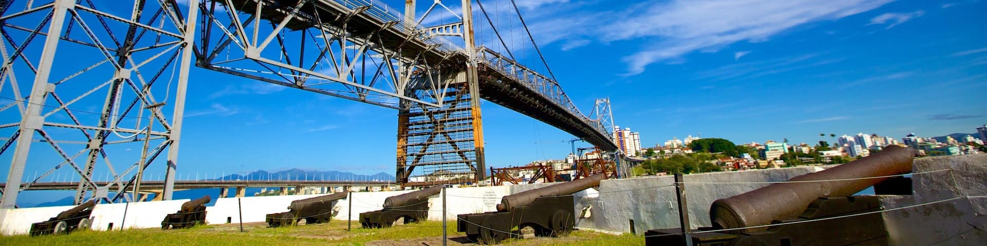 Hercilio Luz Bridge featuring military items and a bridge