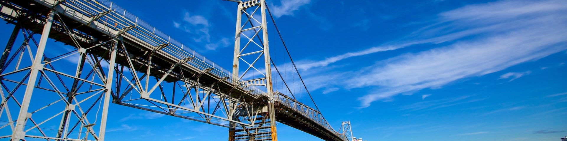 Hercilio Luz Bridge featuring military items and a bridge