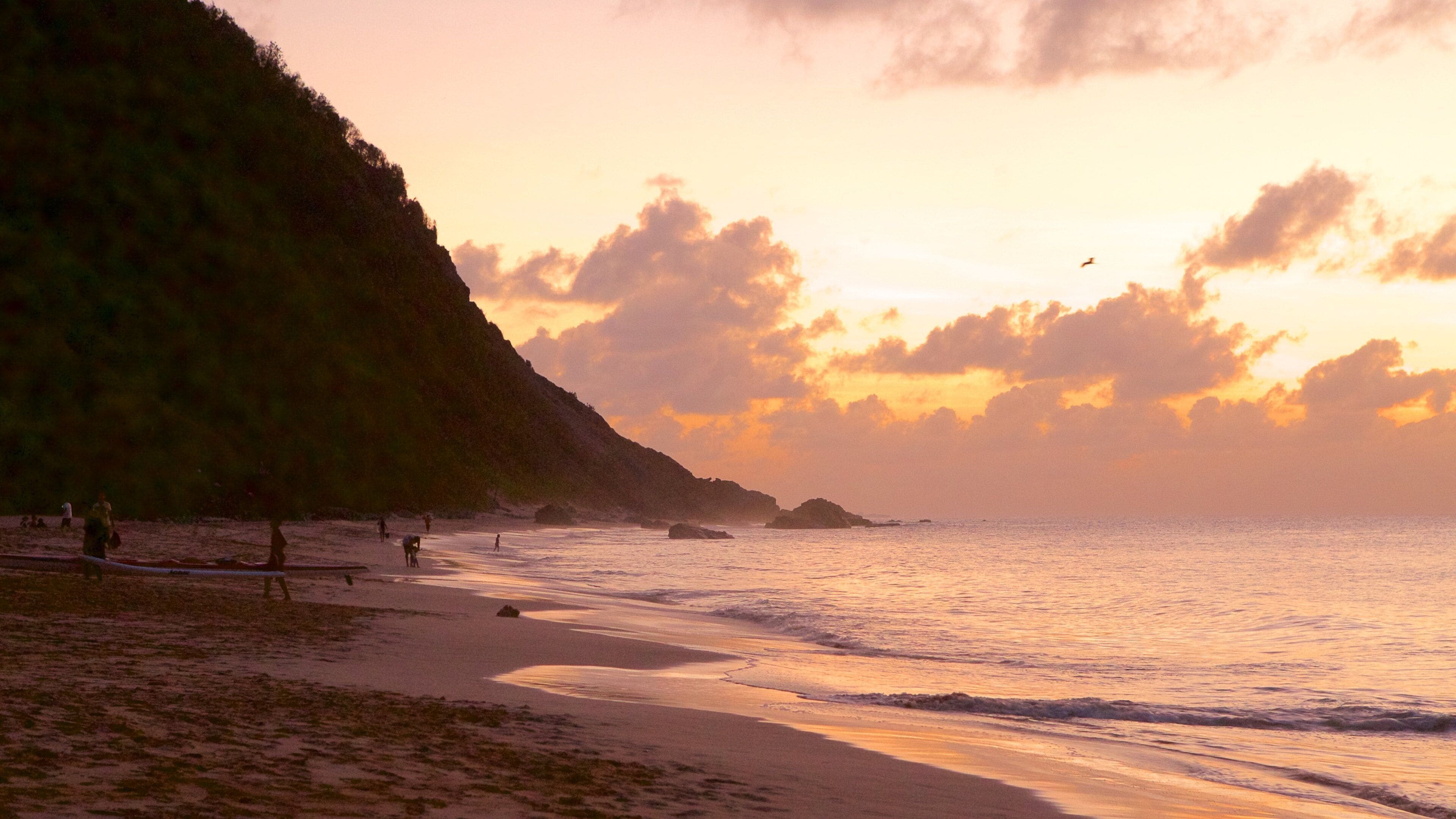 Conceicao Beach showing a sunset and a beach