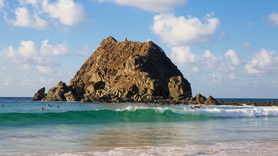 Conceicao Beach featuring waves, general coastal views and surfing