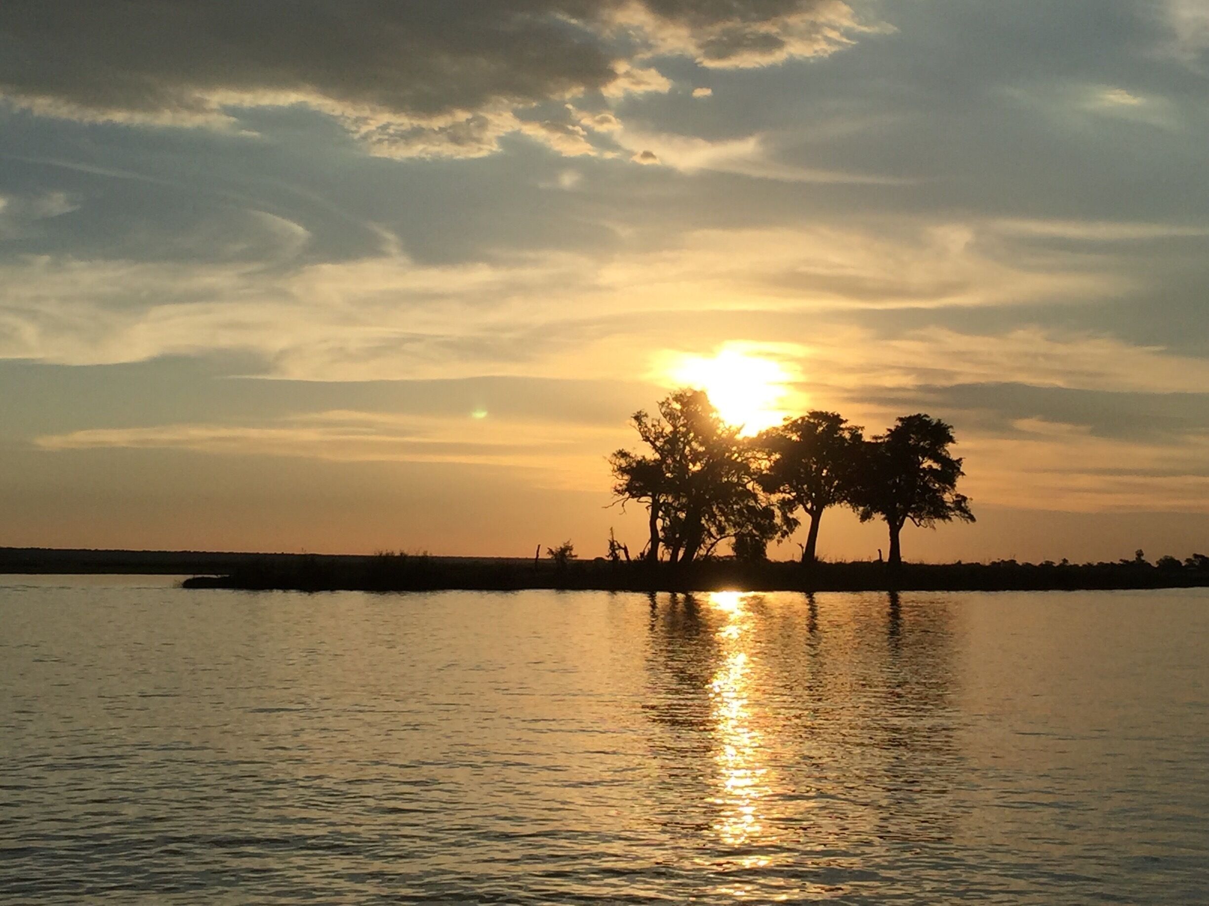 A beautiful adventure to cruise the Chobe River just before sunset.  Hippotomus, Crocodiles, Baboons, Impala, Zebra, Elephants ...
