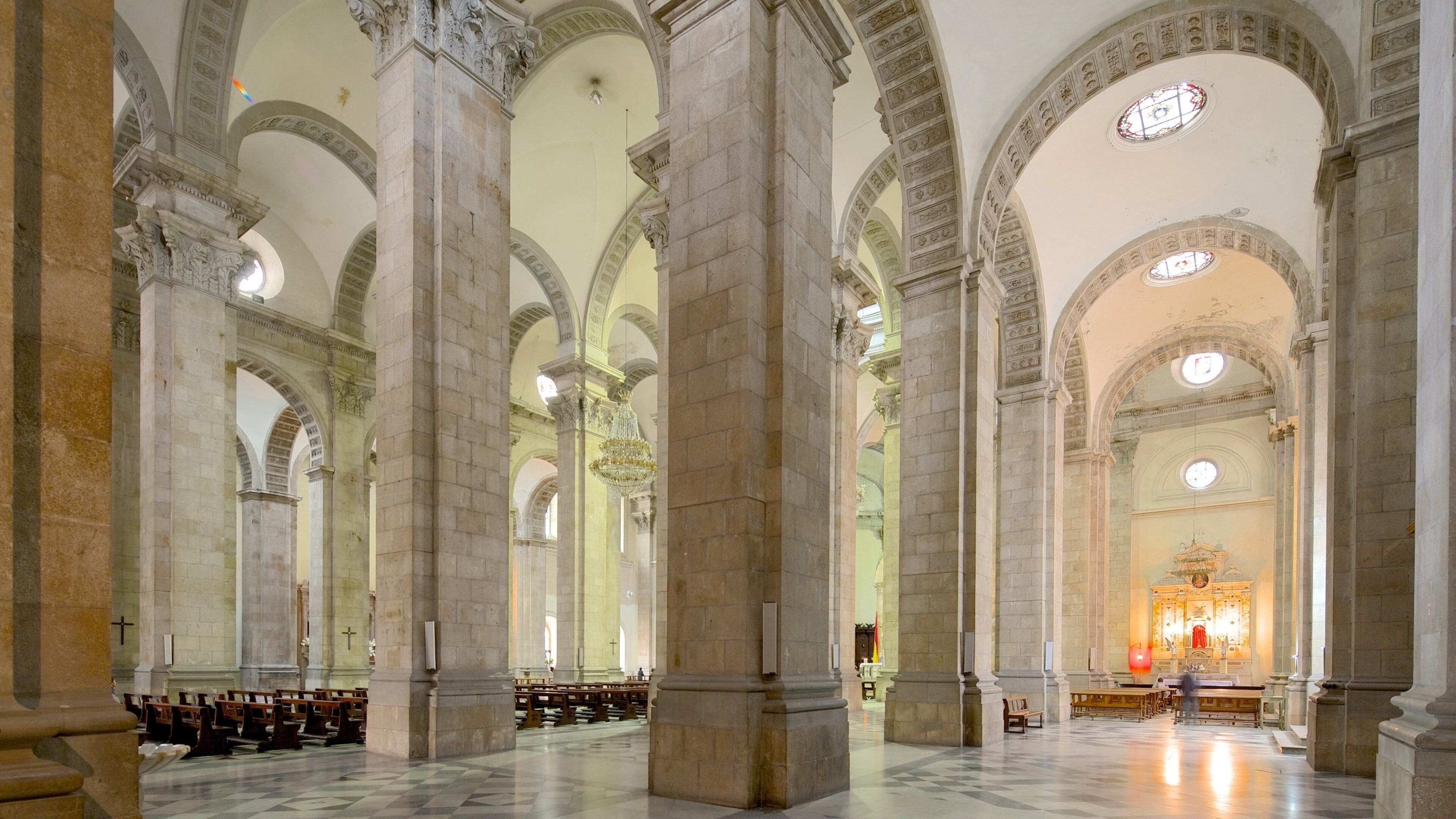Plaza Murillo featuring religious elements, interior views and heritage architecture