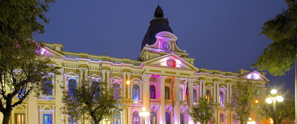 Plaza Murillo which includes heritage architecture, a square or plaza and night scenes