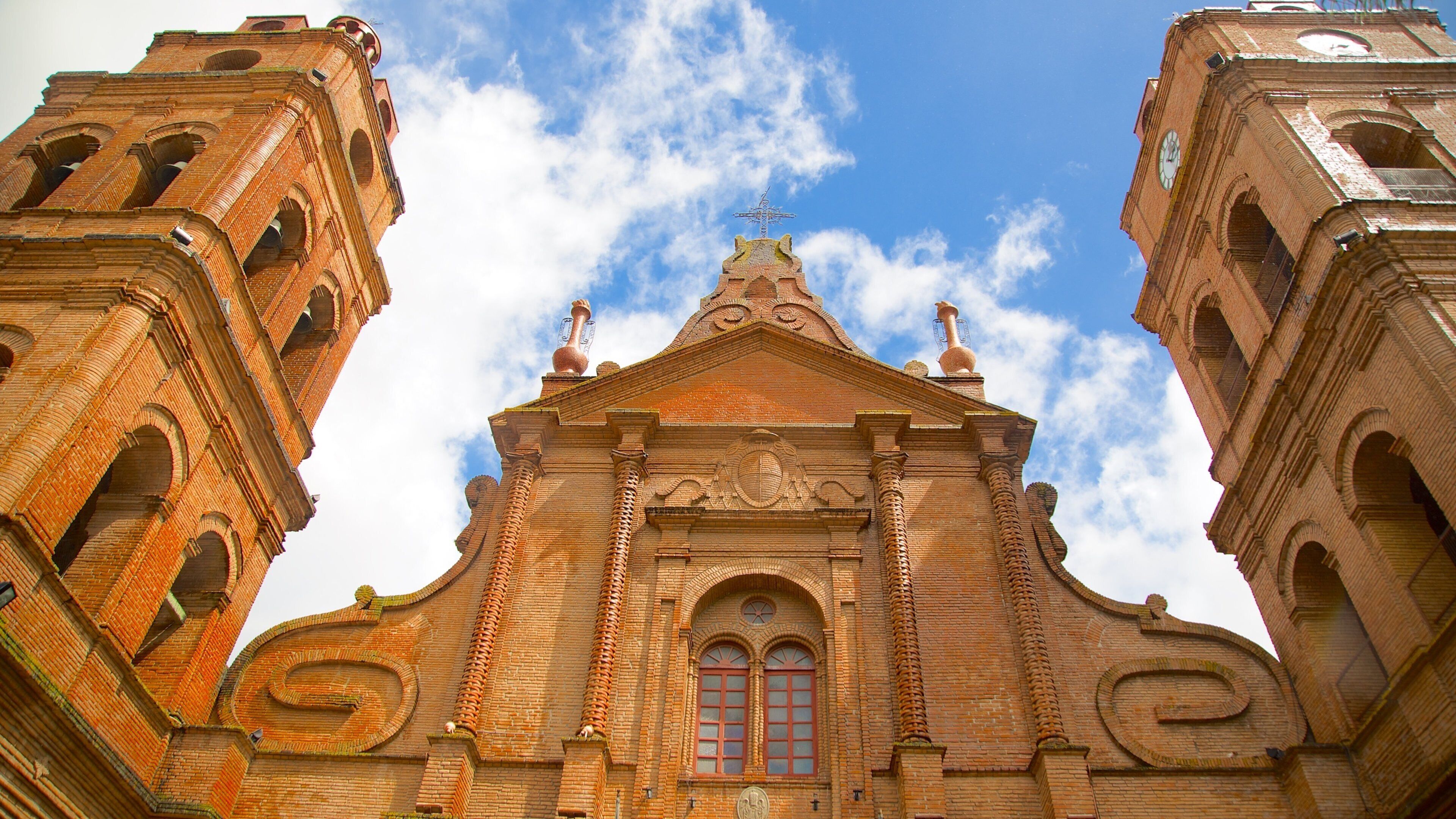 A historic church with two bell towers and a central facade.