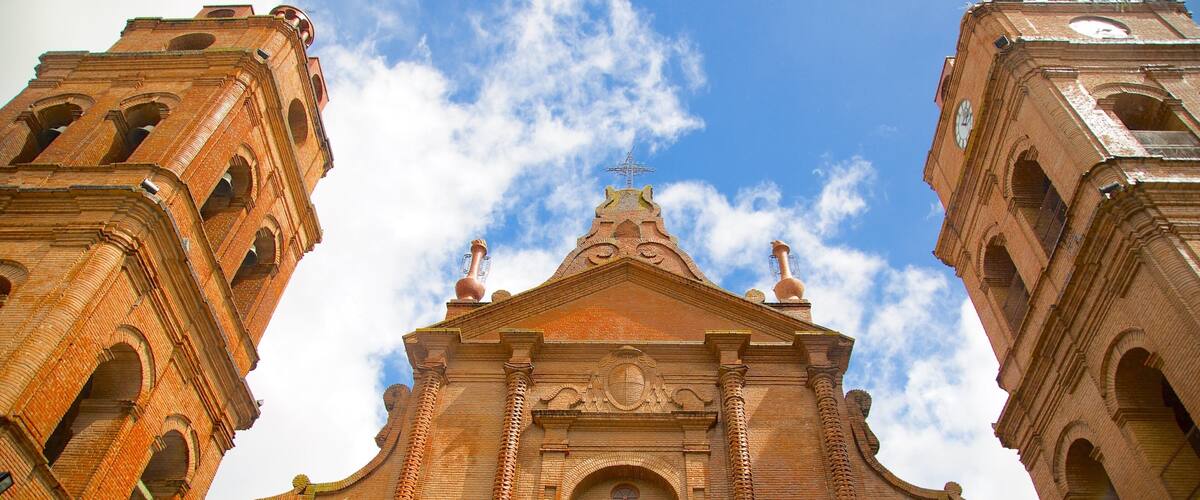 A historic church with two bell towers and a central facade.
