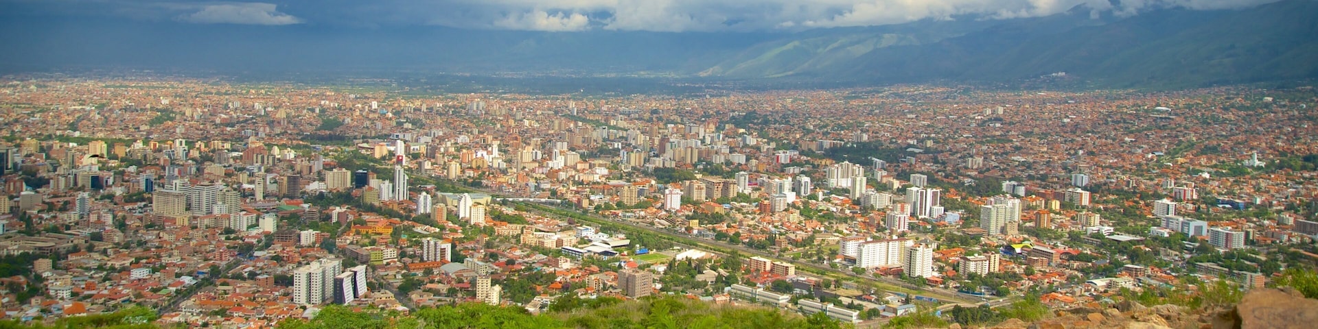 Cristo de la Concordia featuring a city