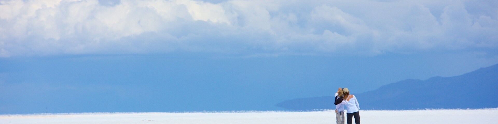 Salar de Uyuni which includes tranquil scenes as well as a small group of people