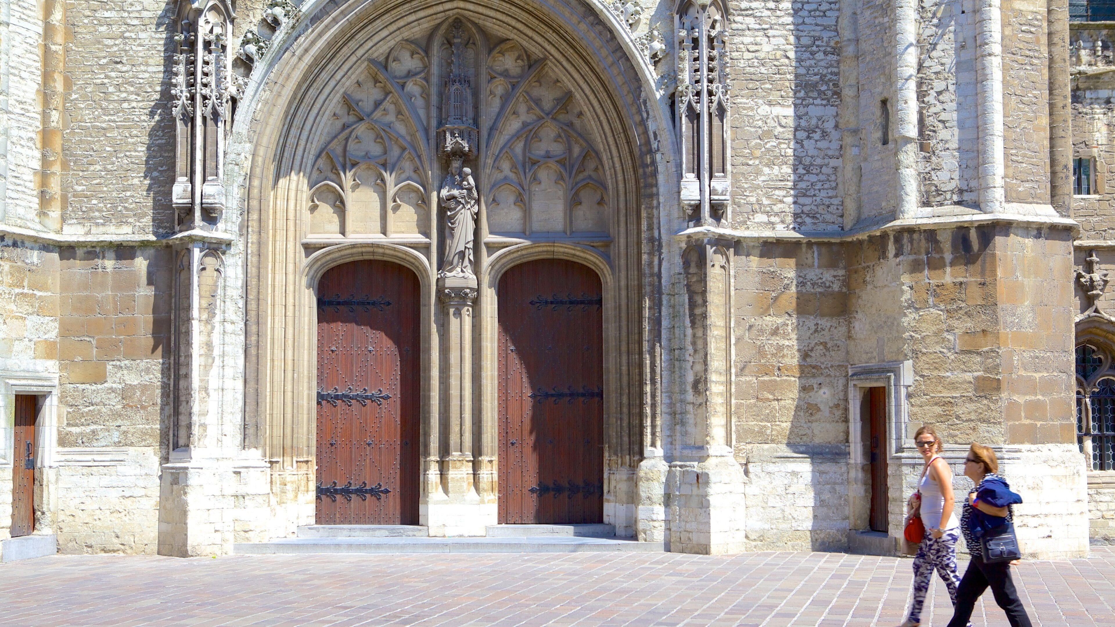 Saint Bavo Cathedral which includes a church or cathedral, street scenes and religious elements