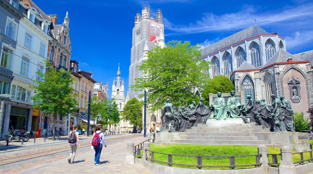 Saint Bavo Cathedral showing a statue or sculpture and a city