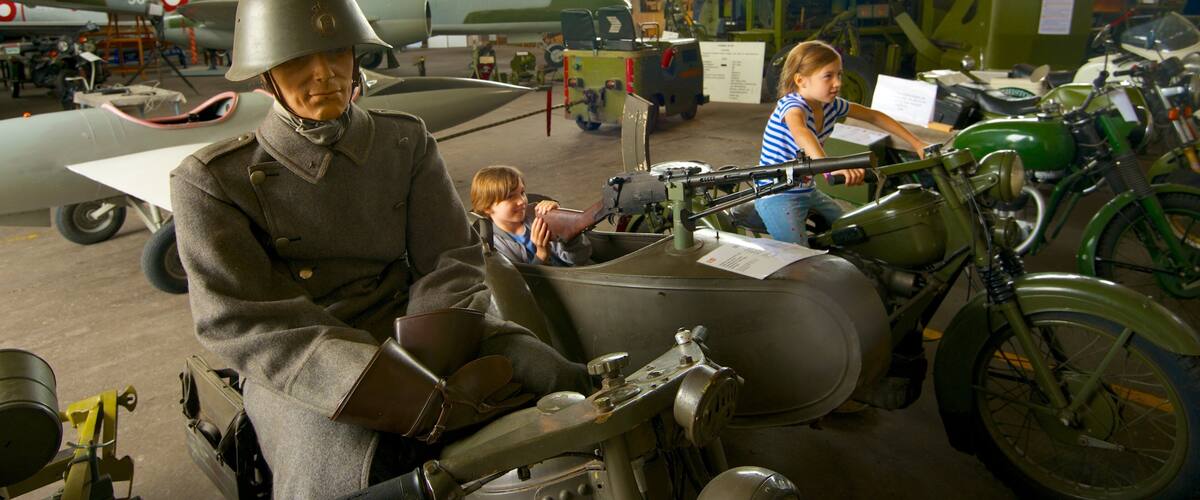 Defence and Garrison Museum featuring interior views as well as children