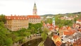 Cesky Krumlov Castle featuring a city and a river or creek