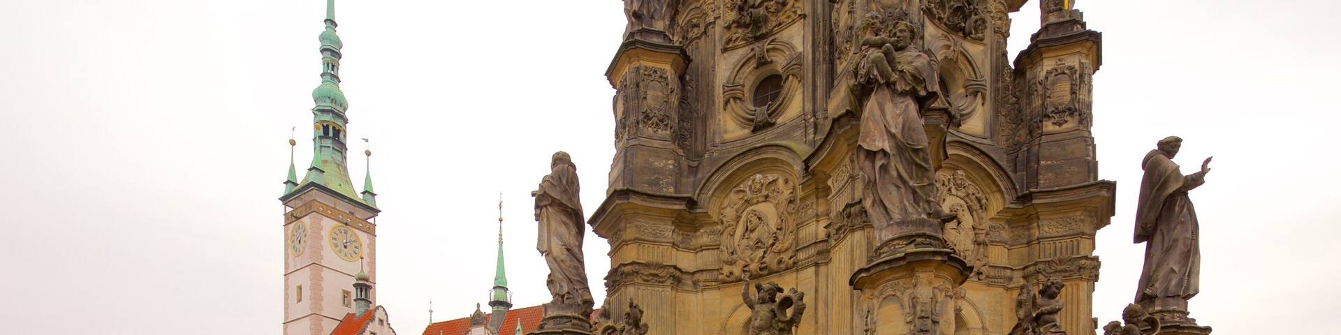 Holy Trinity Column which includes heritage elements, a square or plaza and a statue or sculpture